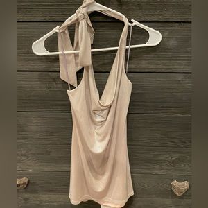 Silver sparkly cocktail dress with a droopy neckline and a open back